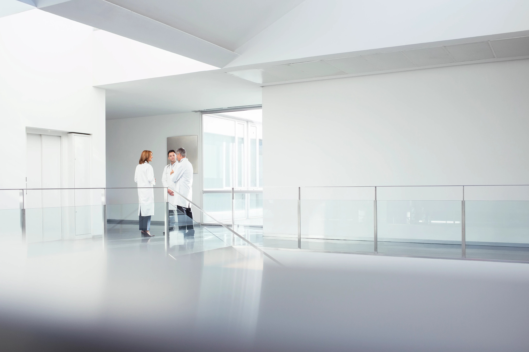 research models and services team members in lab coats