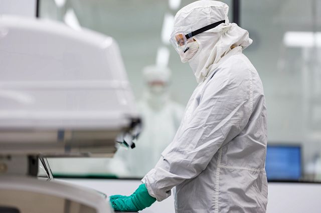 Charles River lab technician working at computer
