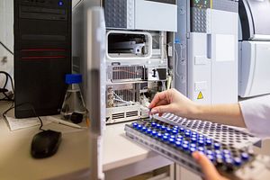 Laboratory scientist prepares samples for download to High-performance Liquid Chromatograph Mass Spectrometry