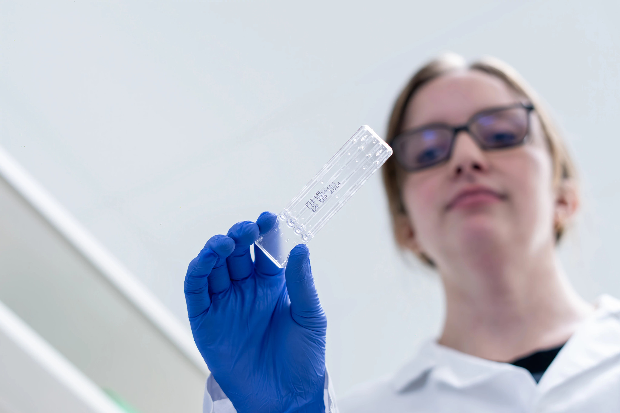 Scientist Holding a Cartridge