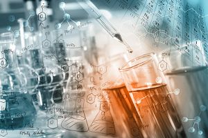 Digital collage of research-related images, including test tubes, liquid dropping from a pipette, drawings of molecular structures of organic compounds, and glass flasks in a laboratory setting