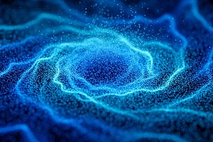 Vortex-like particle flow visualization, suggesting fluid dynamics or energy field simulation.