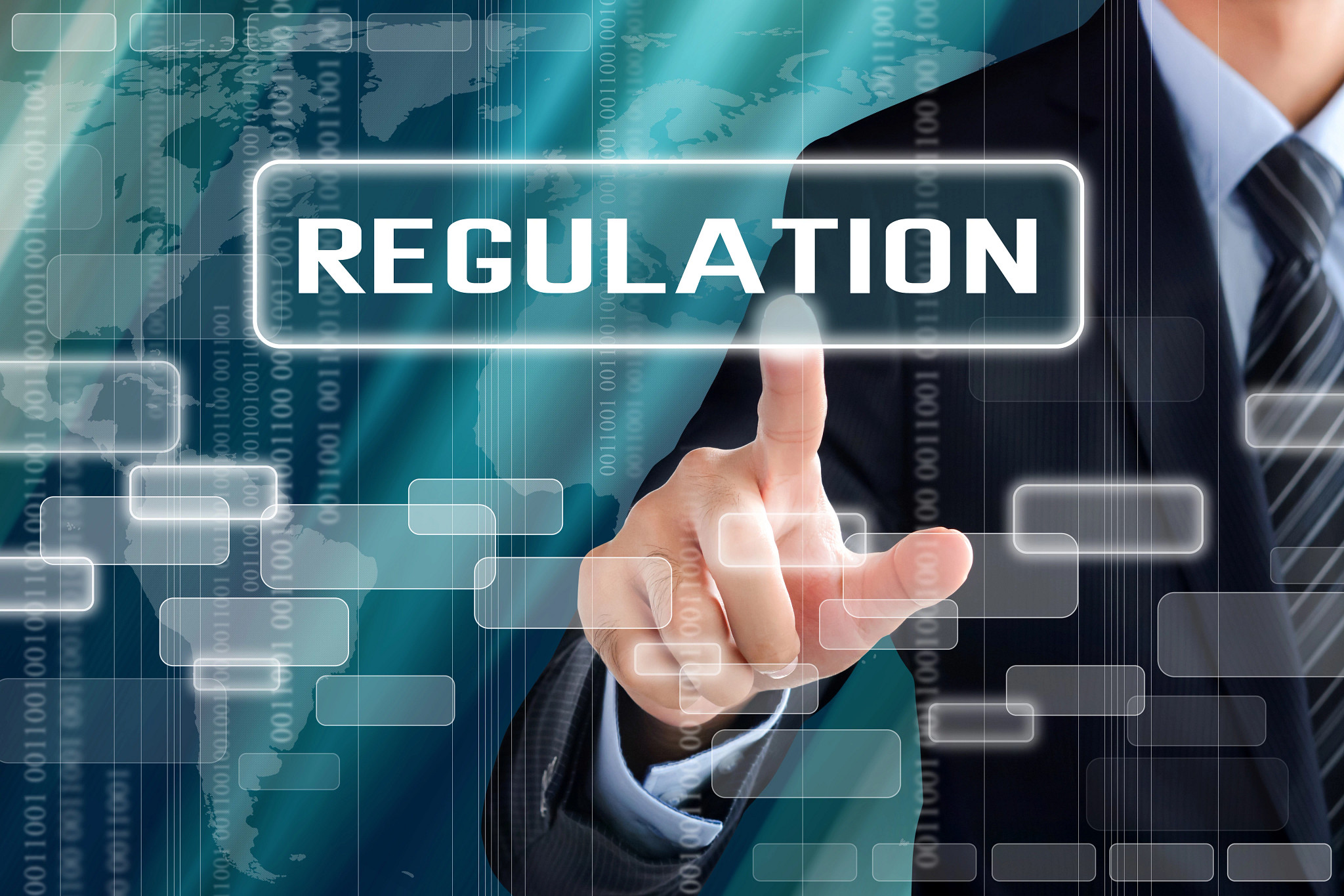 Businessman hand touching REGULATION  sign on virtual screen