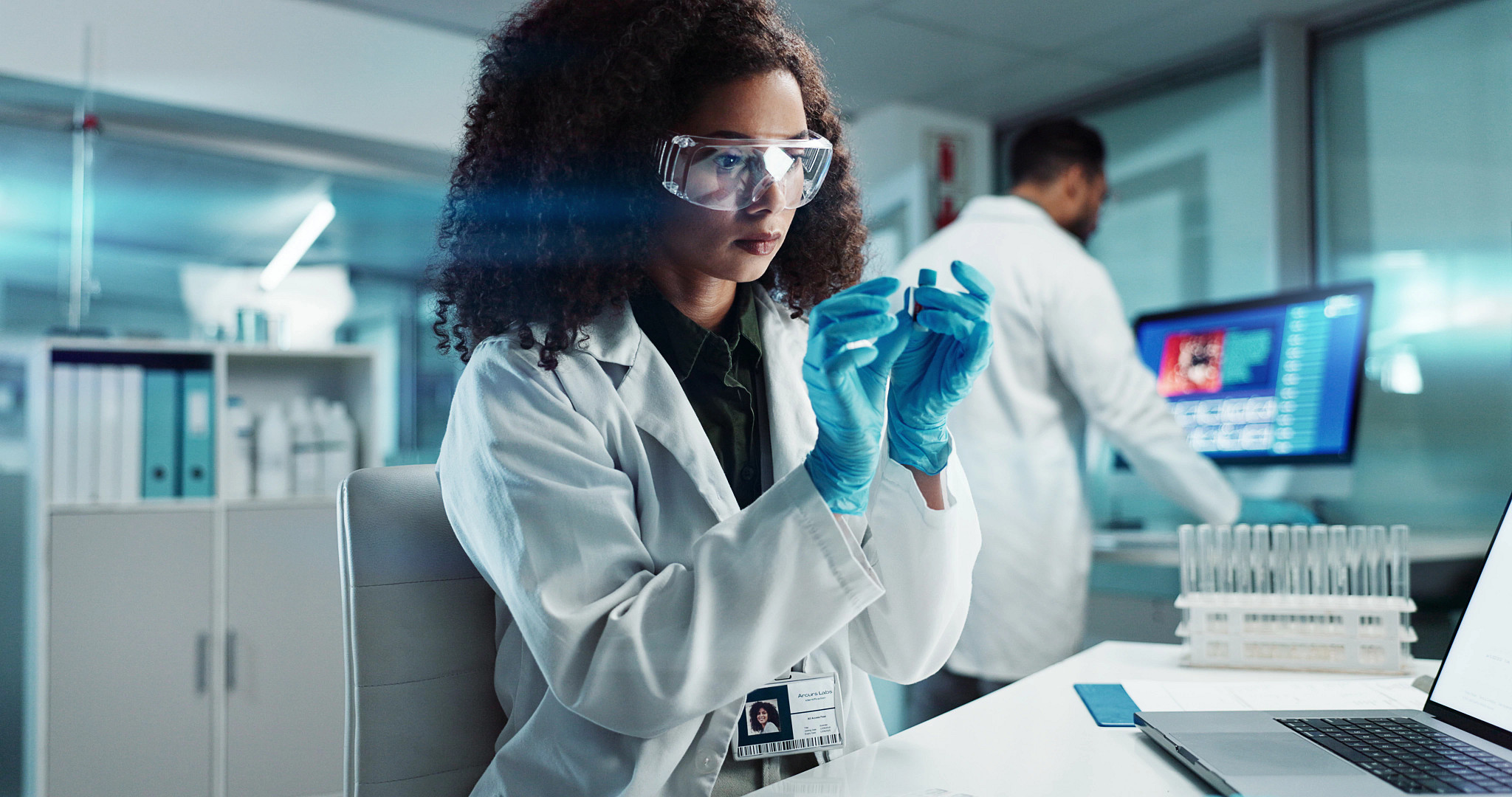 Scientist evaluating oncology toxicology data to support IND submission and first-in-patient dose strategy