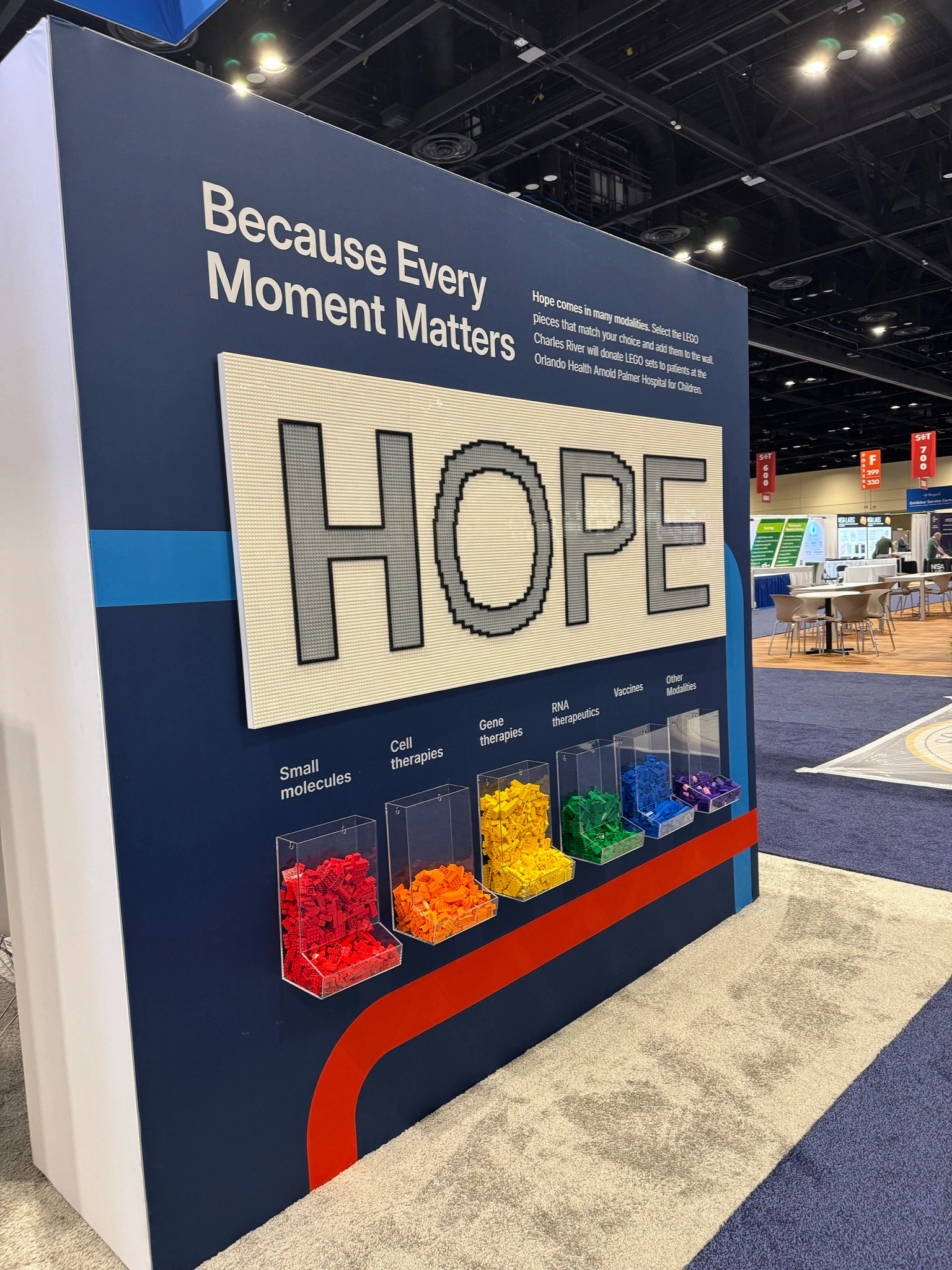 lego pieces displayed in a booth at a trade show