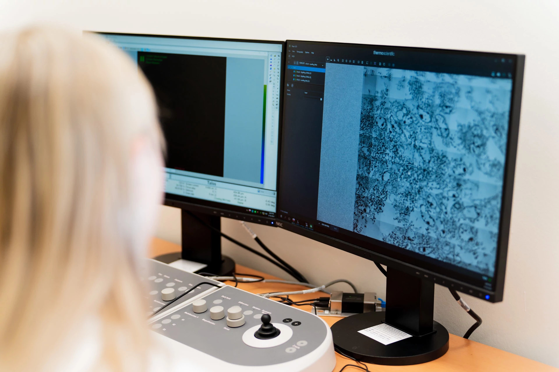 Scientist conducting cryogenic electron microscopy (cryo-EM) services at the ATEM facility.