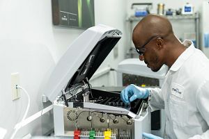Lab Technician Using the Celsis Advance II