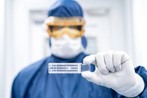 Scientist holding a cartridge