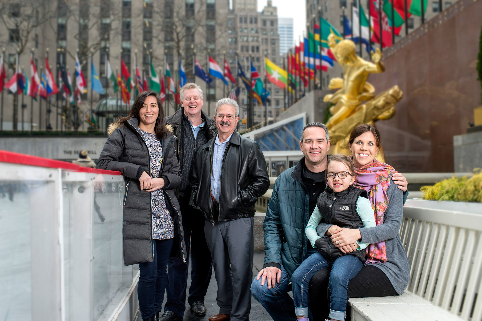 Photo of Evie with her family and team of doctors in New York City.