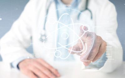 View of a Doctor holding an atom icon surrounded by data