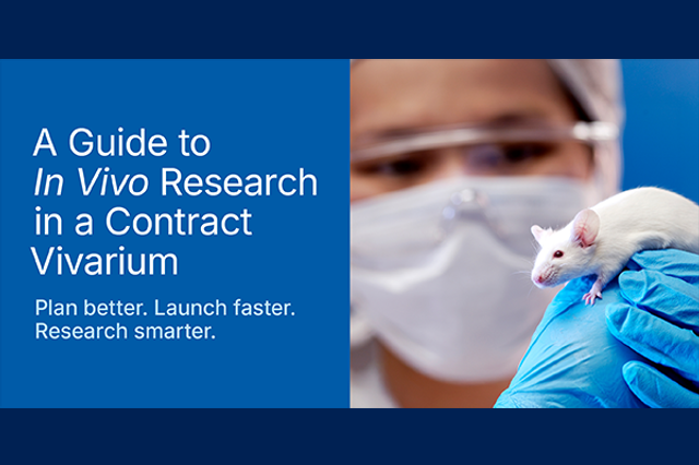 female vivarium animal technician checking an isolator