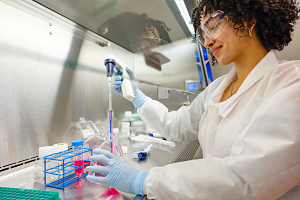 photo of lab technician working with stem cells