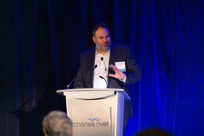 Terry Pirovolakis standing on stage.