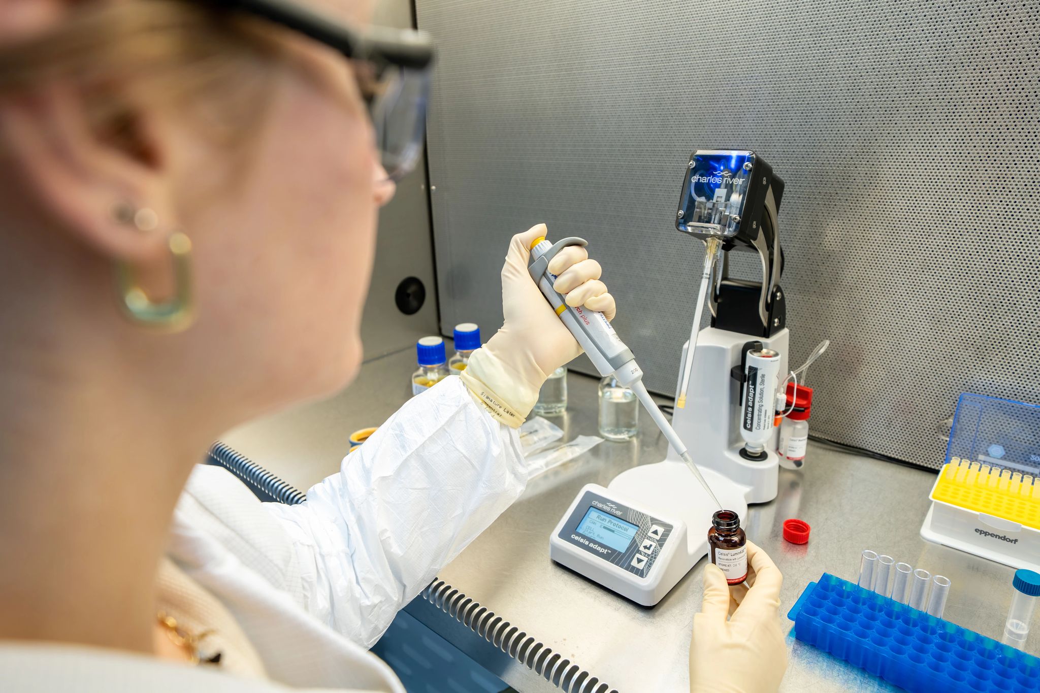 A Scientist using the Celsis Adapt to perform sterility testing for cell samples