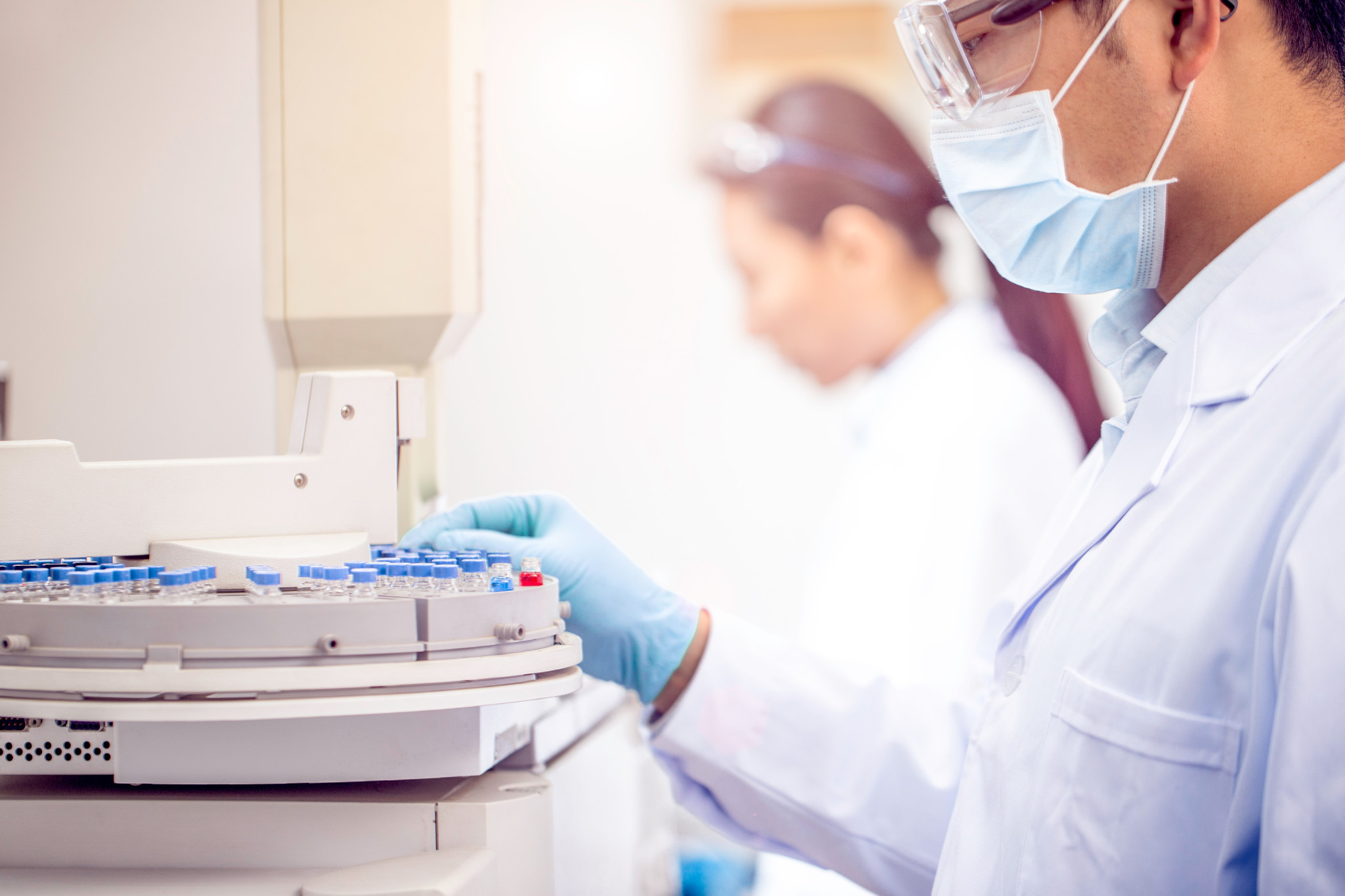 Scientists experimenting in laboratory 