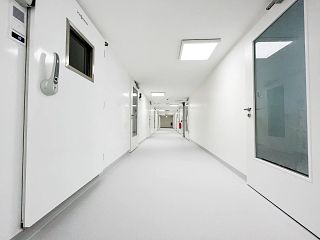 White hallway at the ATEM facility.