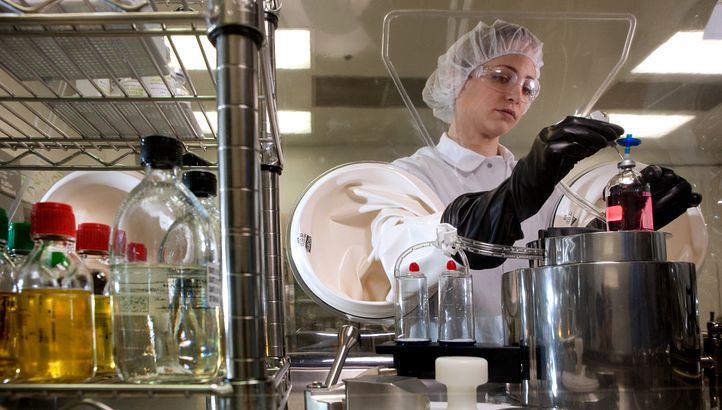 scientist working in biologic drug development testing lab