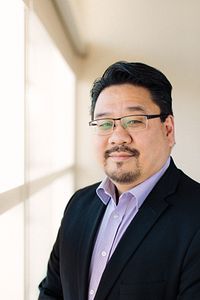 Headshot of Sam Chuang PhD